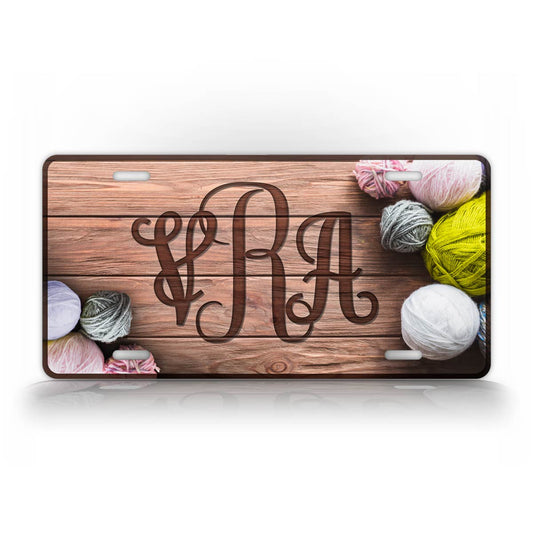 Custom Yarn Monogram With Engraved Wood Background License Plate