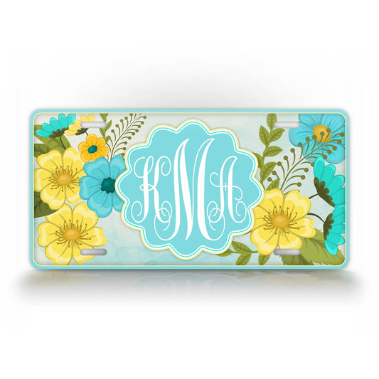 Custom Vibrant Blue And Yellow Flower monogram License Plate