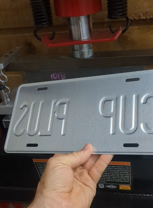 A fully embossed New York vintage license plate replica.