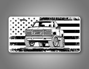 4x4 Chevy Square Body Truck On A Black And White American Flag