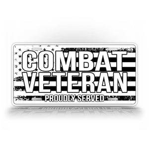 Black And White License Plate Featuring An American Flag And The Text Combat Veteran Proudly Served
